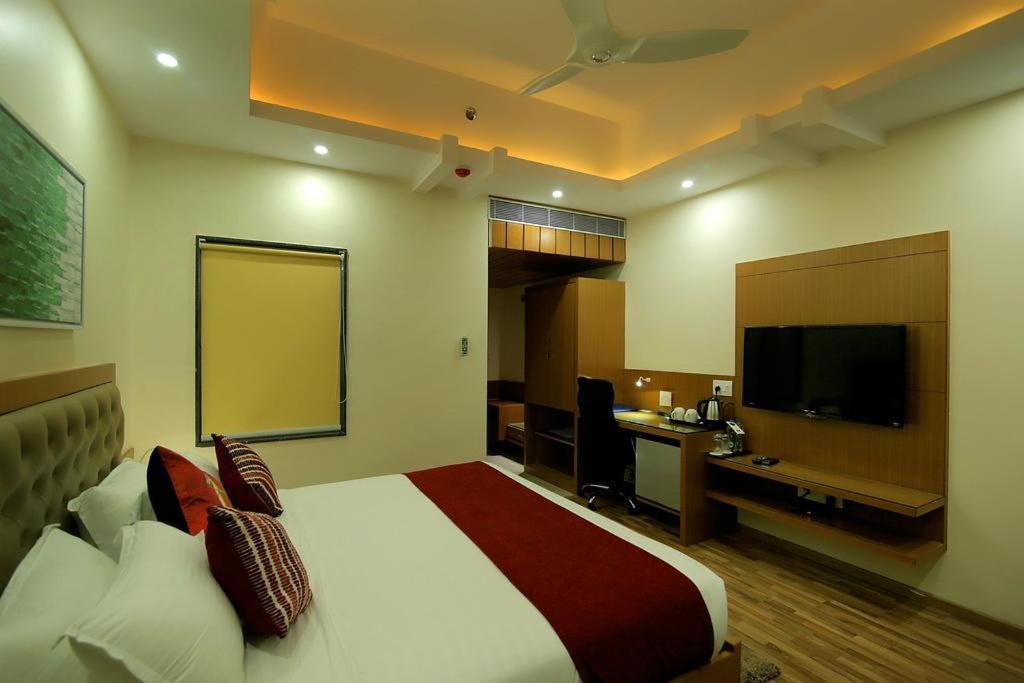 Hotel Hampi International Hospet Extérieur photo