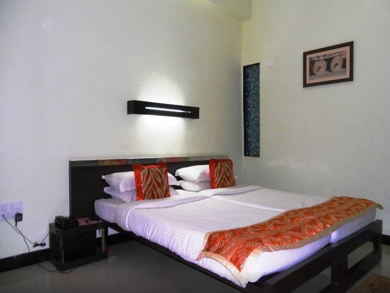 Hotel Hampi International Hospet Extérieur photo